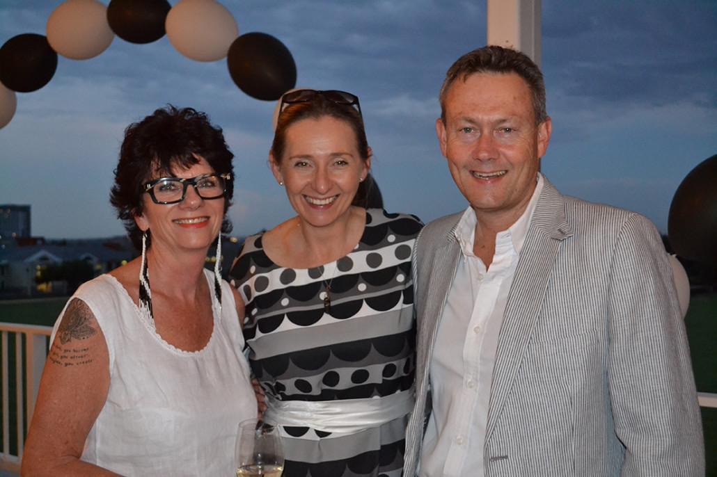 Nicola Tyler with friends at a rooftop gathering